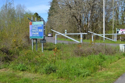 Tualatin Hills Nature Park entrance - driveway entrance gate - sidewalk on Millikan Way